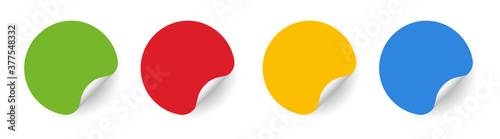 Set of colored Round adhesive stickers with curved corner. Blank mockup circle sticky label. Realistic textures. Vector illustration, EPS10.