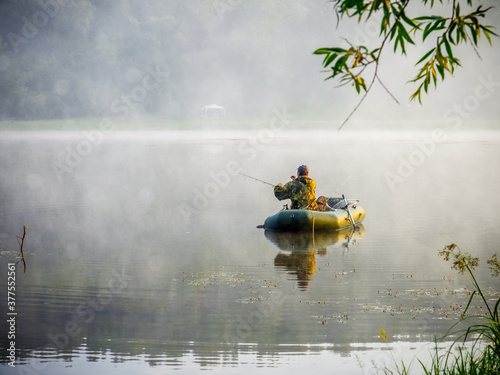 How cool early in a foggy summer morning to cook gears, get in the boat and try to catch your luck by the tail.