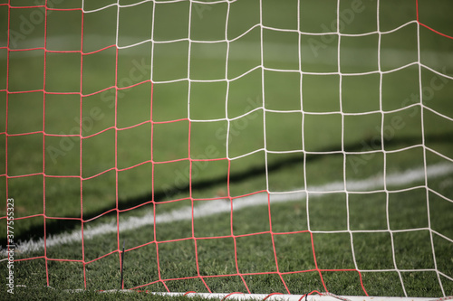 Shallow depth of field (selective focus) with the net of a soccer gate.