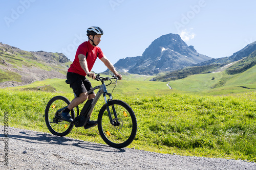 Man Riding Electric Mountain Bike