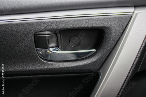 Interior door handle of a budget vehicle