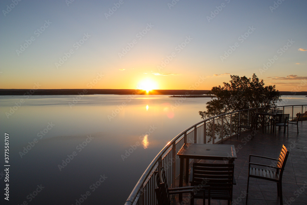 Sunset on a lake viewing deck Sunset on a lake viewing deck