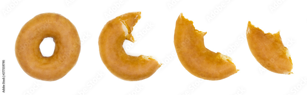 Sequence of sugar-glazed doughnut bites on white background – perfect for food design and advertisements Sequence of sugar-glazed doughnut bites on white background – perfect for food design and advertisements