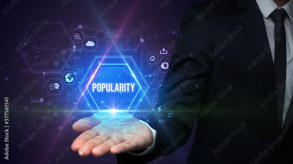 Man hand holding POPULARITY inscription, social media concept Man hand holding POPULARITY inscription, social media concept