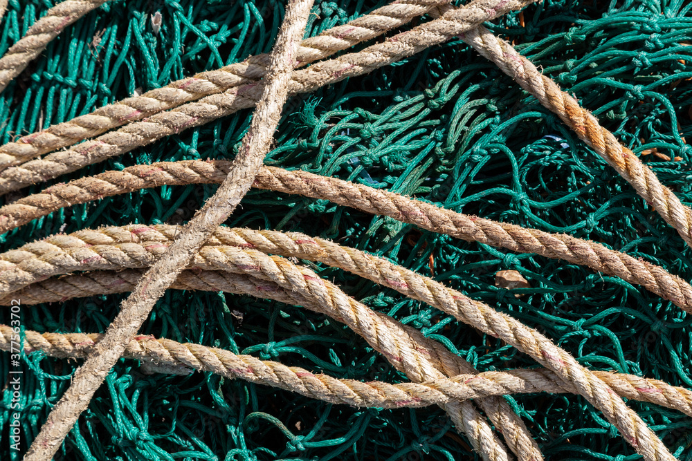A close up of fishing nets on a fishing boat using selective focus