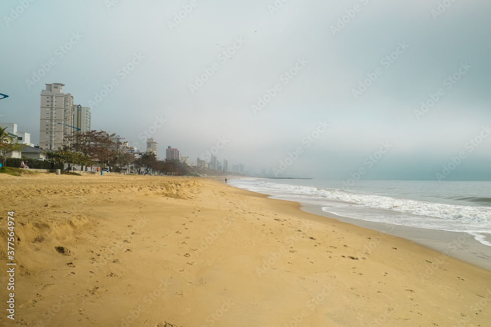 morning mist fog in the city beach