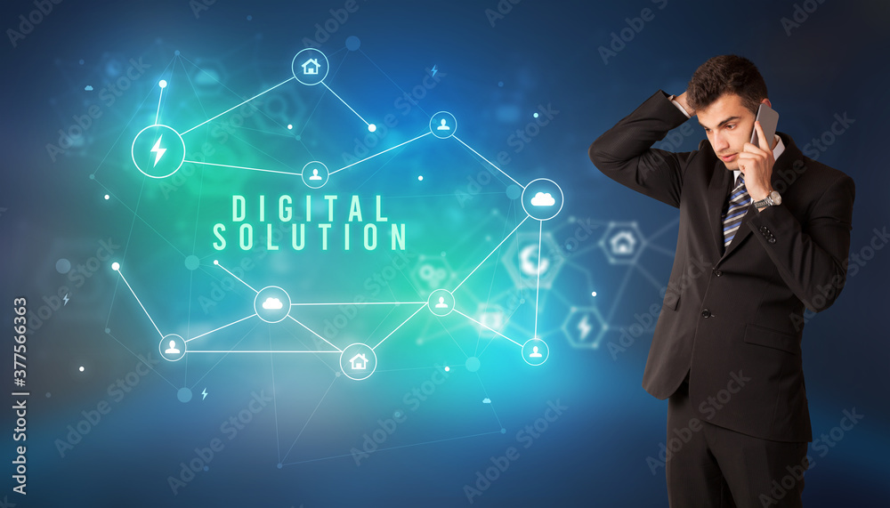Businessman in front of cloud service icons with DIGITAL SOLUTION inscription, modern technology concept Businessman in front of cloud service icons with DIGITAL SOLUTION inscription, modern technology concept