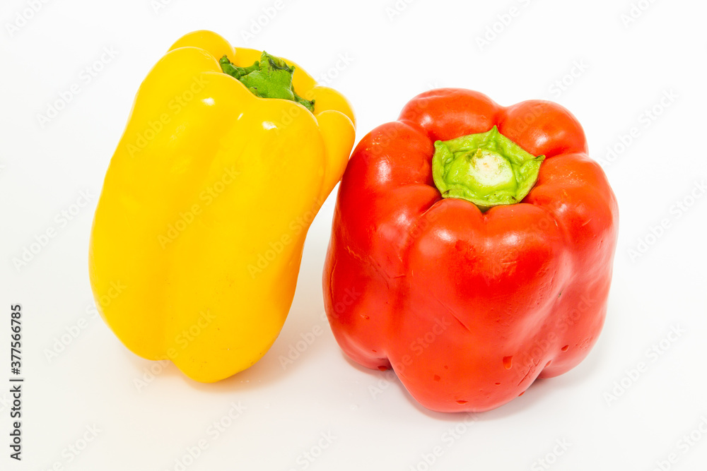 yellow and red fresh bell peppers, on white background yellow and red fresh bell peppers, on white background