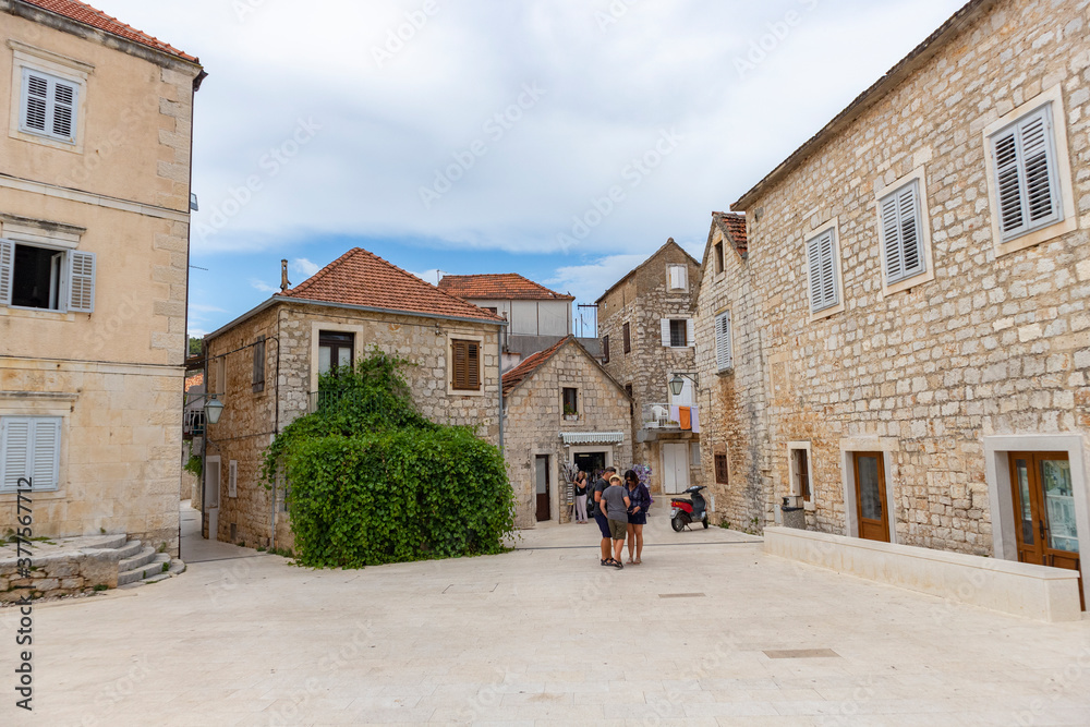 Jelsa/ Croatia-August 7th, 2020: Beautiful stone square of the Jelsa/ Croatia-August 7th, 2020: Beautiful stone square of the