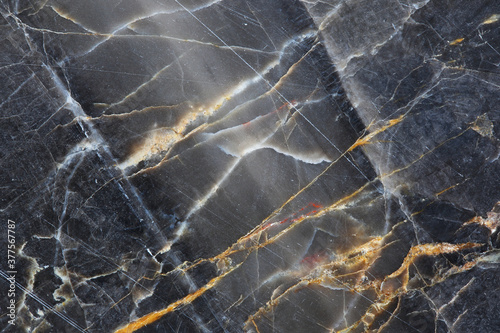 Patterned detailed of gray marble pattern (Gold Russia) texture for design product. Abstract marble background