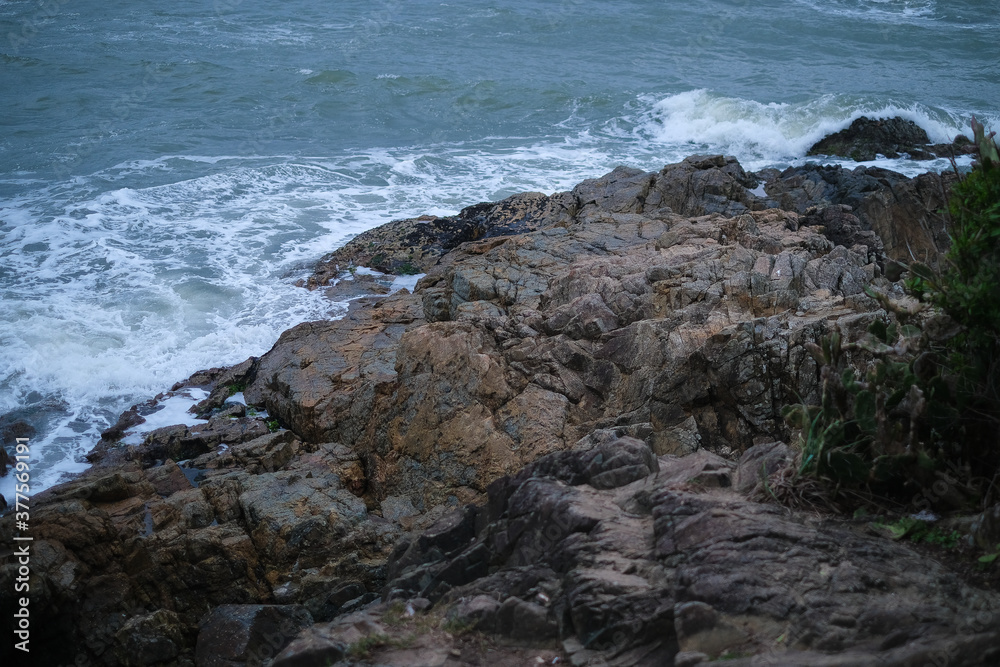 clouds over the sea rocks 