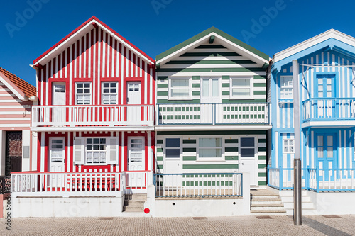 Aveiro, Portugal,  typical fishermen houses with striped colors in costa nova photo