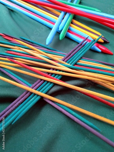grab sticks on the table