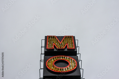 Motel sing partially visible from low angle
