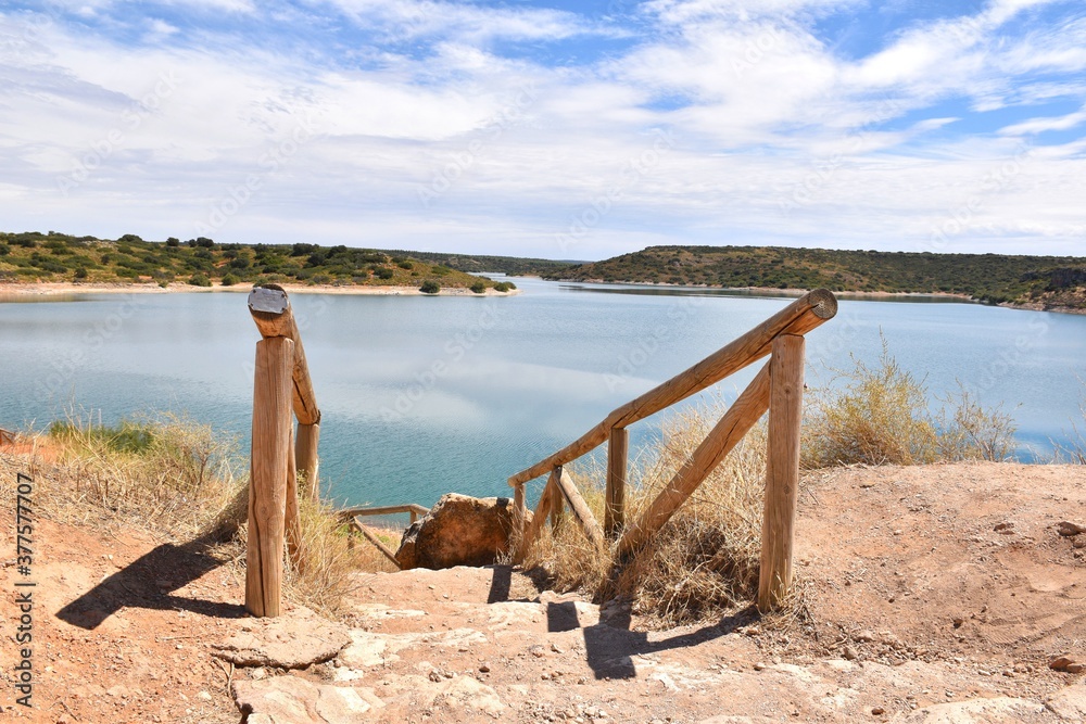 Wooden stairs down to the Peñarroya reservoir, Ruidera lagoons.