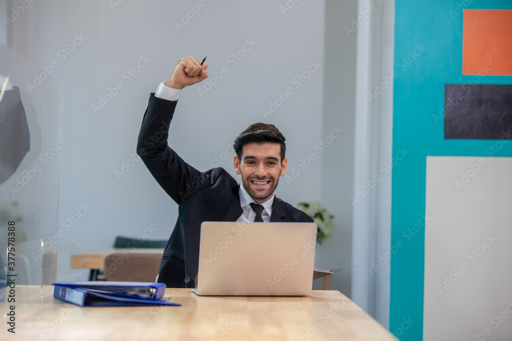 businessman celebrate his success. Winner, Successful businessman with arms up celebrating his victory businessman celebrate his success. Winner, Successful businessman with arms up celebrating his victory