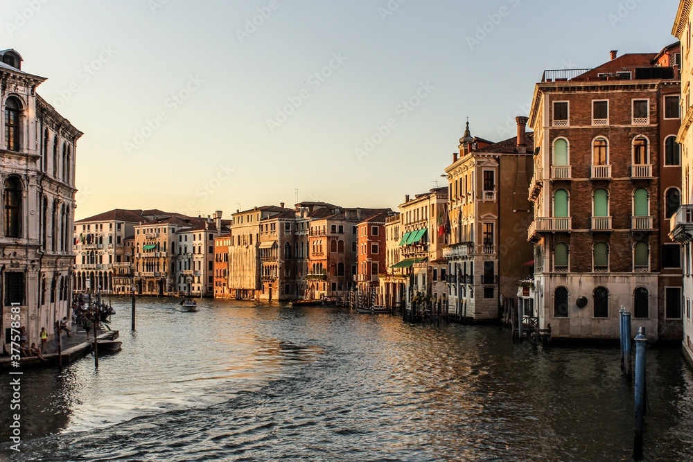 Sunset in Grand Canal Venice with old building exteriors