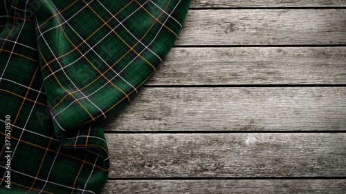 Clan Macalpine Scottish tartan plaid on wood. 3d rendering photo
