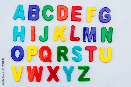 Colored letters in English on a white background