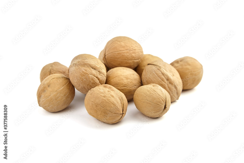 Walnuts heap isolated on white background Walnuts heap isolated on white background