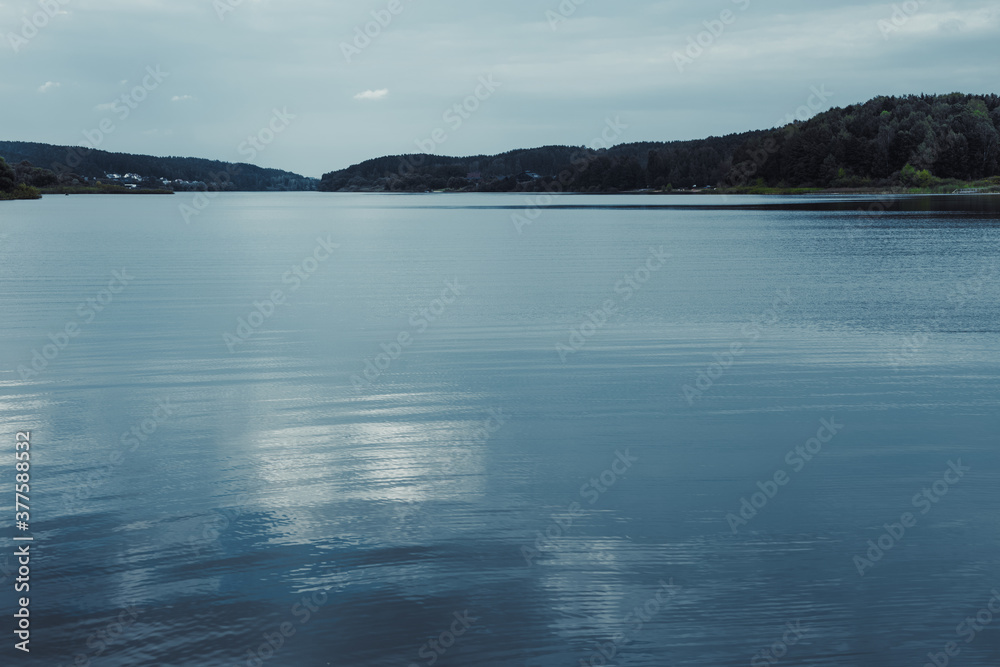 lake and forest in Belarus in the evening lake and forest in Belarus in the evening