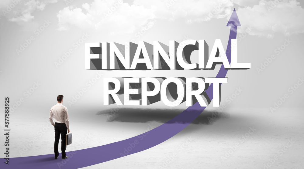 Rear view of a businessman standing in front of FINANCIAL REPORT inscription, successful business concept