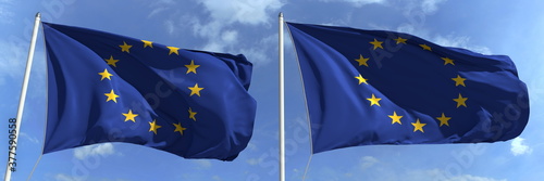 Flying flags of the European Union on high flagpoles. 3d rendering