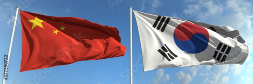 Flying flags of China and Korea on sky background, 3d rendering