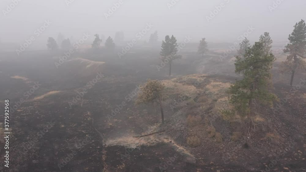 smoky morning in the mountains over wildfire area