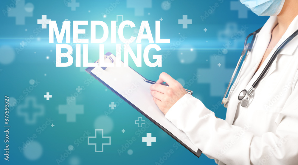 doctor writes notes on the clipboard with MEDICAL BILLING inscription, first aid concept doctor writes notes on the clipboard with MEDICAL BILLING inscription, first aid concept