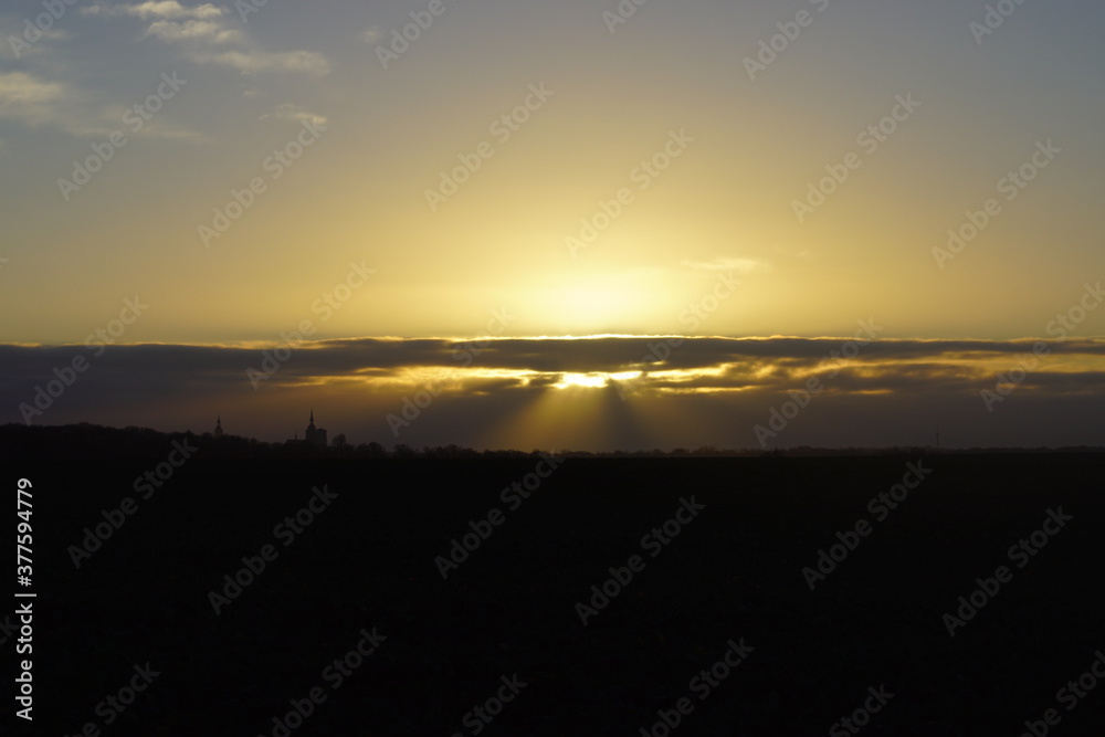 Sonne durch die Wolken