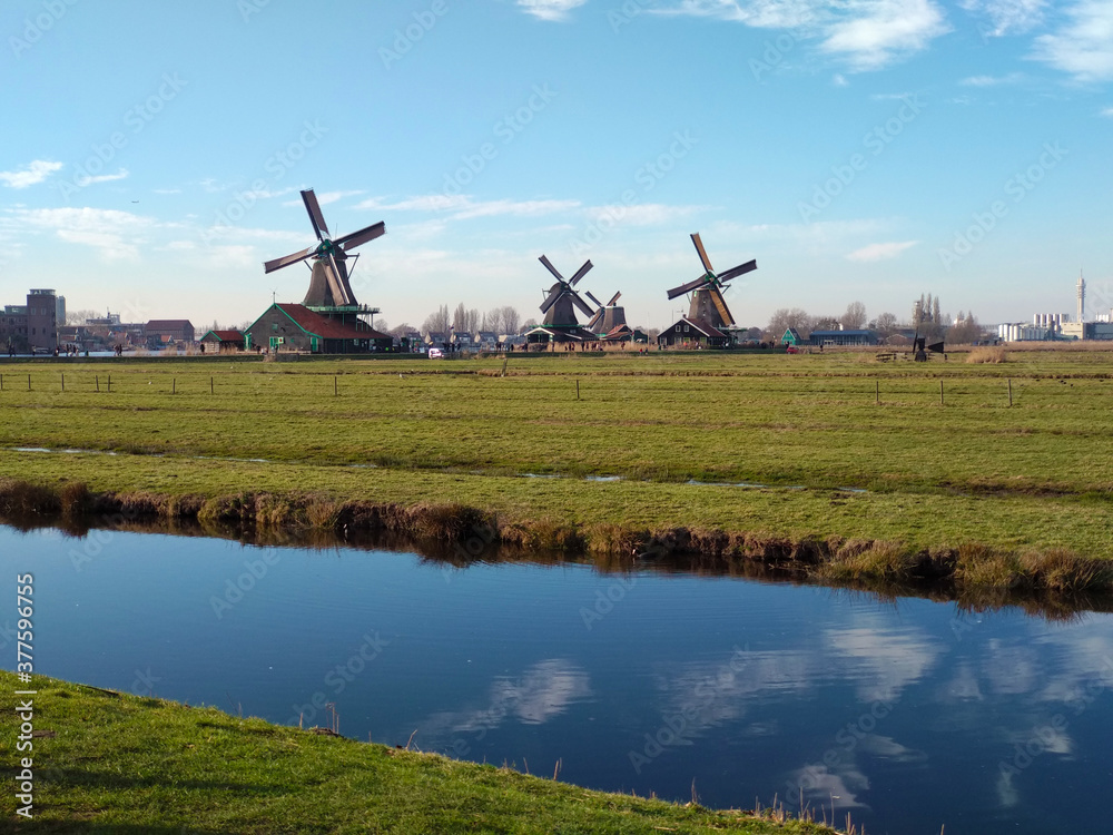 Fototapeta premium beautiful panorama of Zaanse Scans in the Netherlands. Windmills on ponds and streams