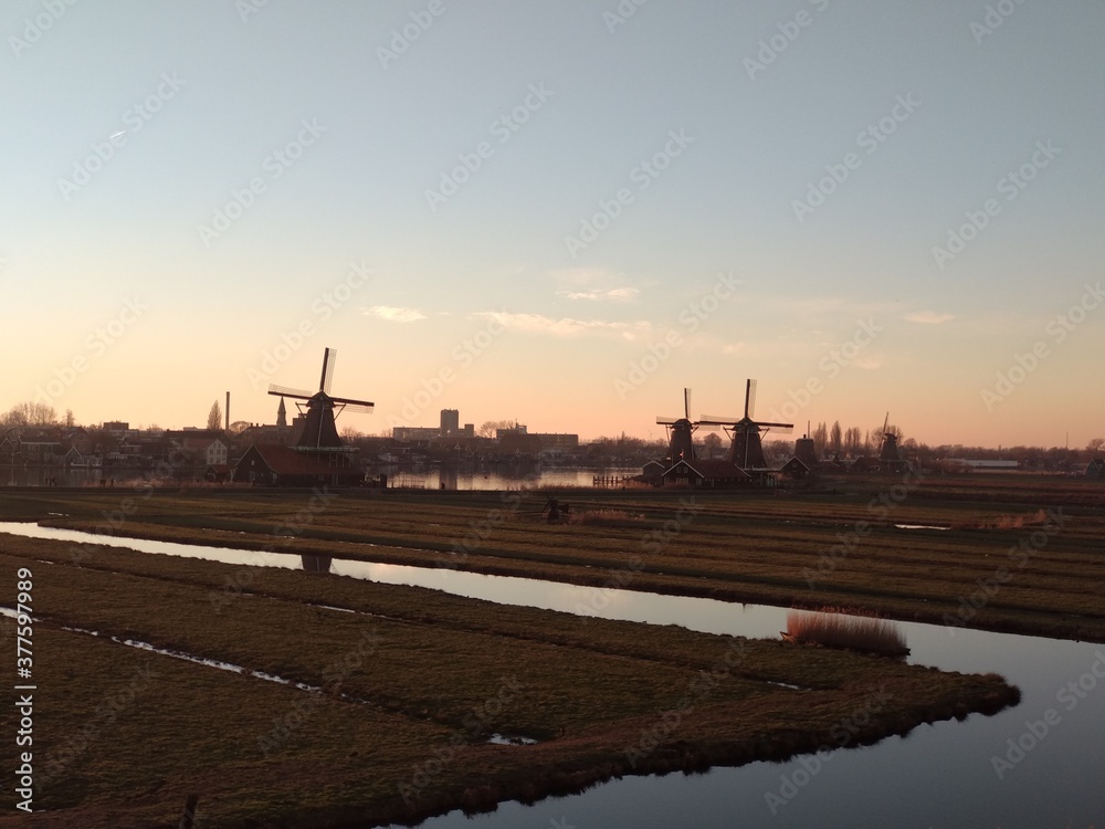 beautiful panorama of Zaanse Scans in the Netherlands. Windmills on ponds and streams
