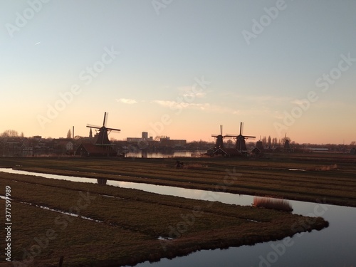 beautiful panorama of Zaanse Scans in the Netherlands. Windmills on ponds and streams