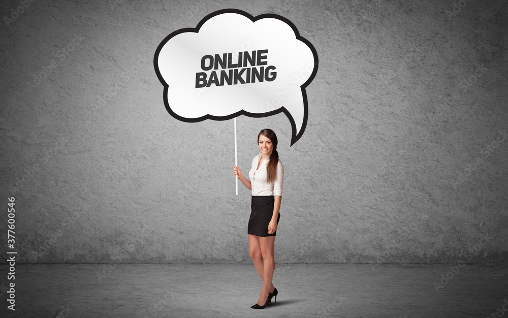 Young business person in casual holding road sign with ONLINE BANKING inscription, new business idea concept Young business person in casual holding road sign with ONLINE BANKING inscription, new business idea concept