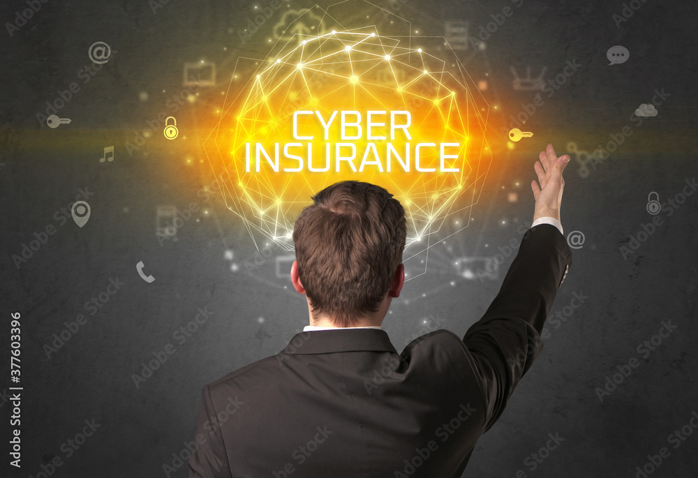 Rear view of a businessman with CYBER INSURANCE inscription, online security concept