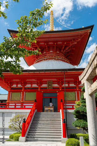Buddha's great vow tower of Nakayamadera temple in Takarazuka city, Hyogo, Japan.  Translation: two Chinese characters on the plate mean 