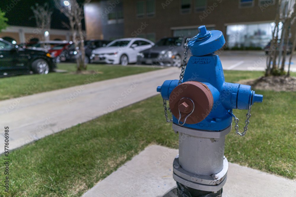 Blue hydrant in the parking lot Blue hydrant in the parking lot
