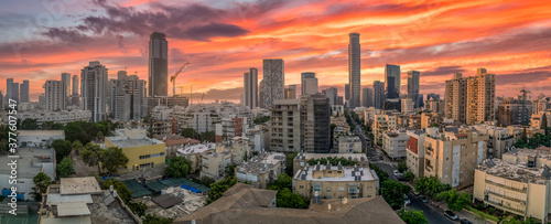 Aerial view of Tel Aviv sky scrapers financial district with colorful dramatic sunset sky in Israel