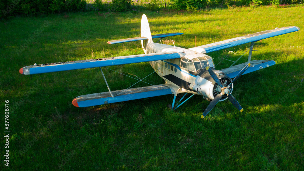 Old abandoned airport with planes. Fuselage, wings and engines. Top view