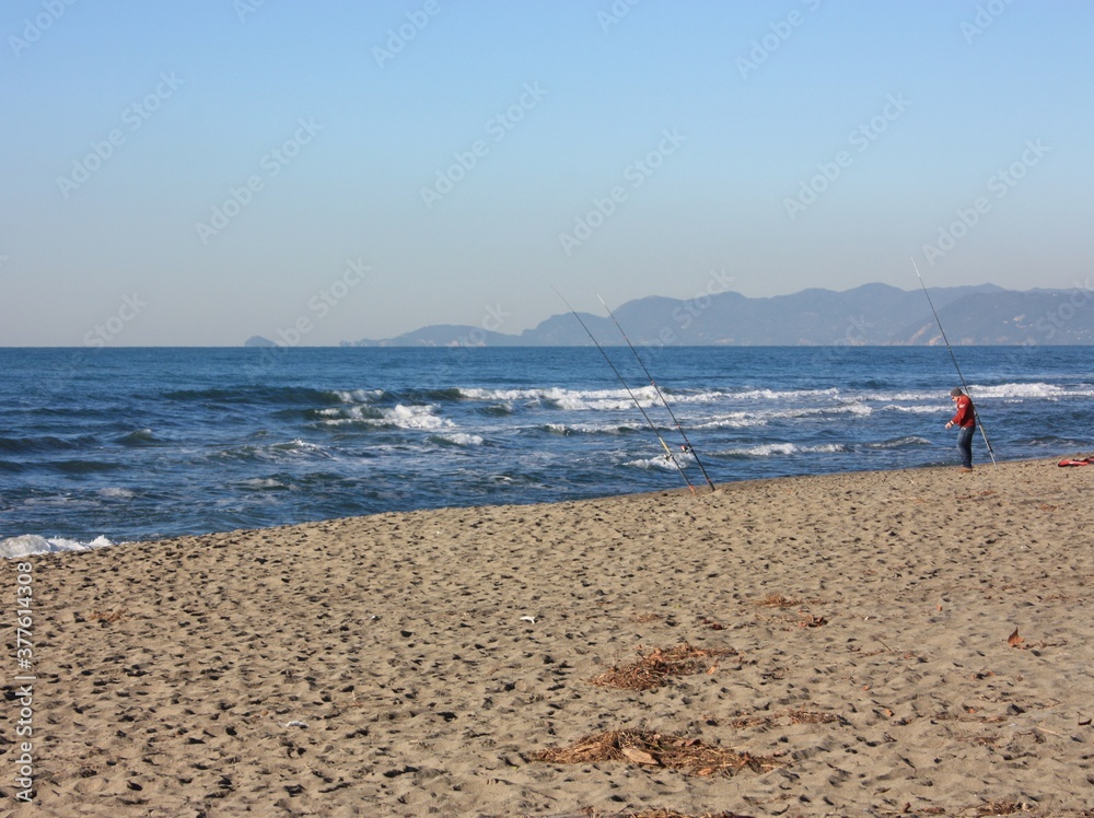by the sea on the sandy beach of an Italian beach establishment in Versilia, Tuscany