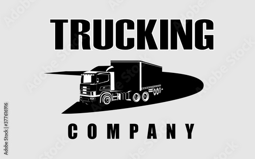 Trucking company logo, truck drives on the road vector