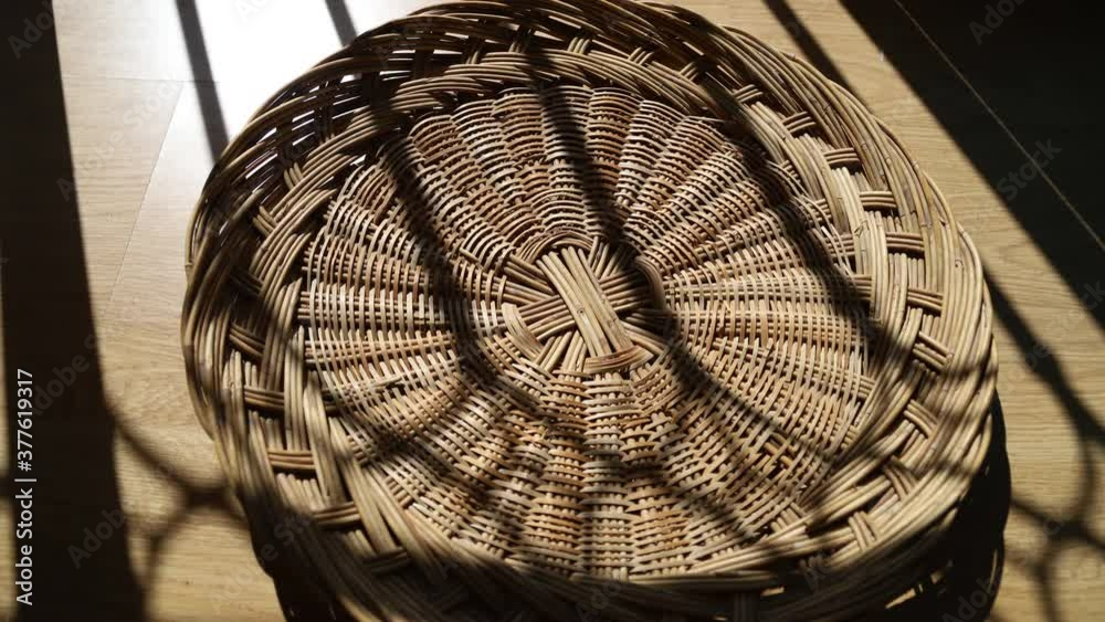 Shadow passing the Korea Traditional wicker tray above