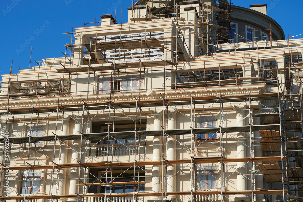 scaffolding and new building as background