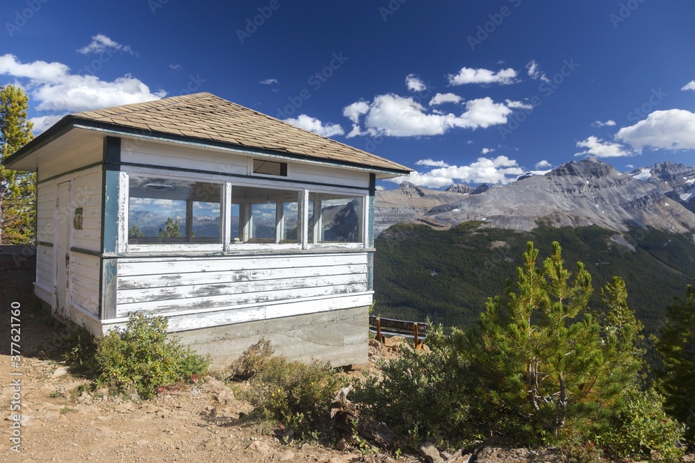 Heritage Fire Lookout Wood Building Structure Exterior and Scenic Canadian Rocky Mountain Peaks Landscape, Yoho National Park, British Columbia, Canada