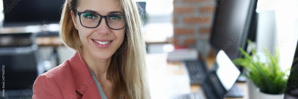 Business woman against modern office background portrait. Business education concept Business woman against modern office background portrait. Business education concept