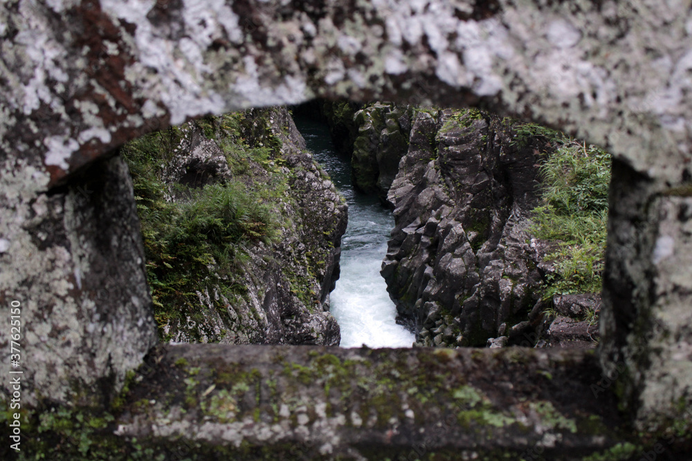 Overlooking river from old bridge at Takachiho Gorge in Miyazaki Overlooking river from old bridge at Takachiho Gorge in Miyazaki