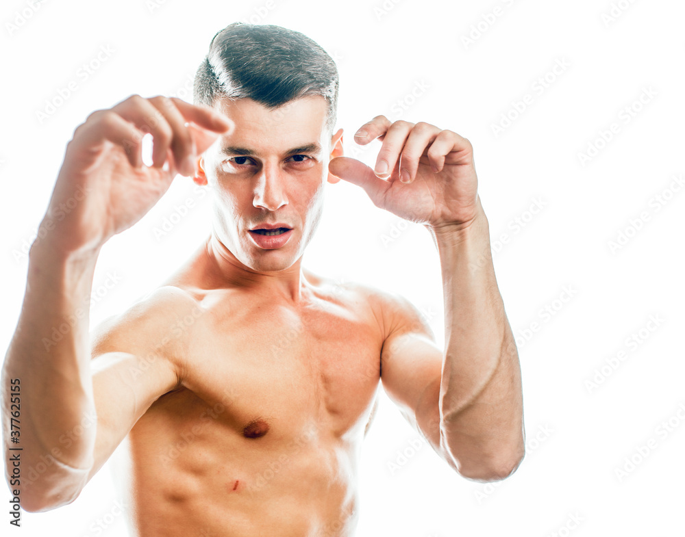Fototapeta premium young handsome agressive man boxing isolared on white background, lifestyle sport people concept