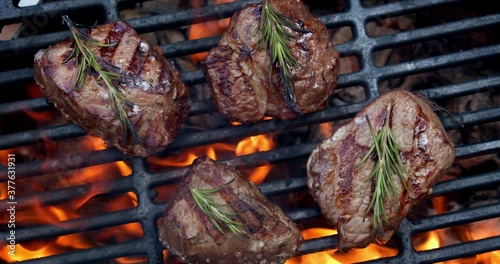 Delicious beef medallions with rosemary on the barbecue. 