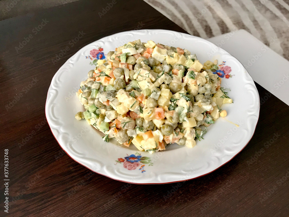 Traditional Russian Salad in Plate. Ready to Serve and Eat. Traditional Russian Salad in Plate. Ready to Serve and Eat.